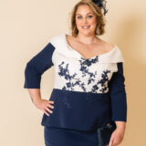 DU4391 Ivory and navy mother of the groom plus size peplum midi dress - front